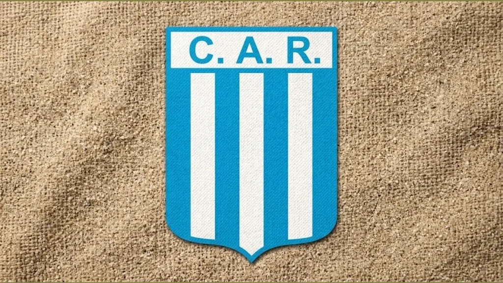 El escudo: Con su tradicional formato heráldico de fondo celeste, destaca en la parte superior la franja blanca con la sigla «C. A. R.», acompañada por los emblemáticos bastones verticales que remiten a su génesis inspirada en la Academia de Avellaneda.